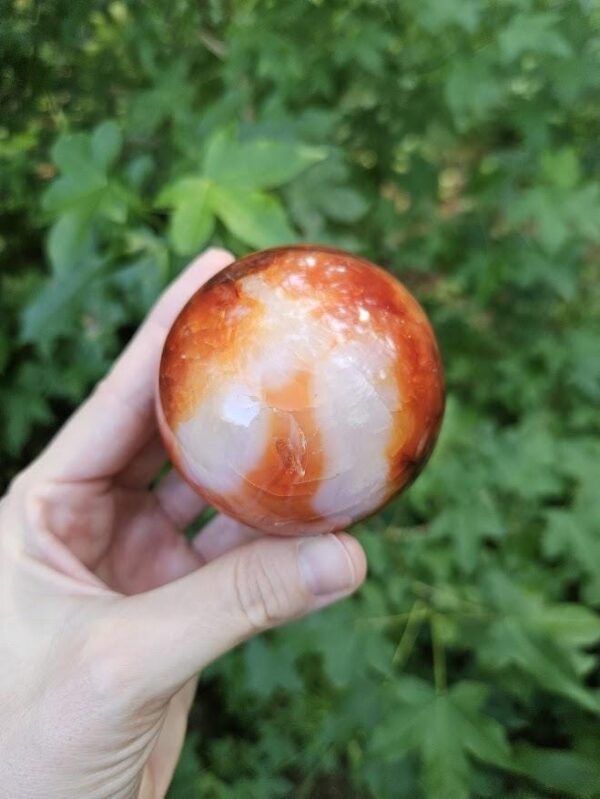 Polished Carnelian Sphere: Sacral Chakra Crystal, Madagascar - Image 5