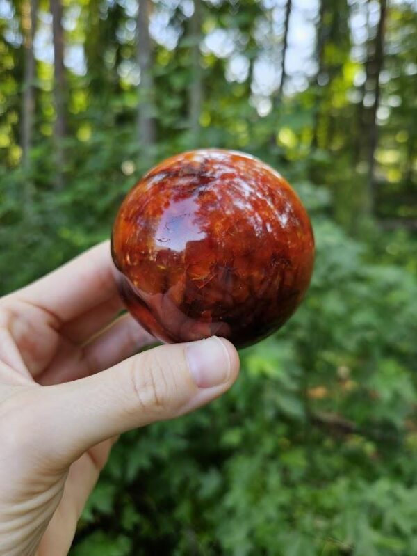 Polished Carnelian Sphere: Sacral Chakra Crystal, Madagascar - Image 7
