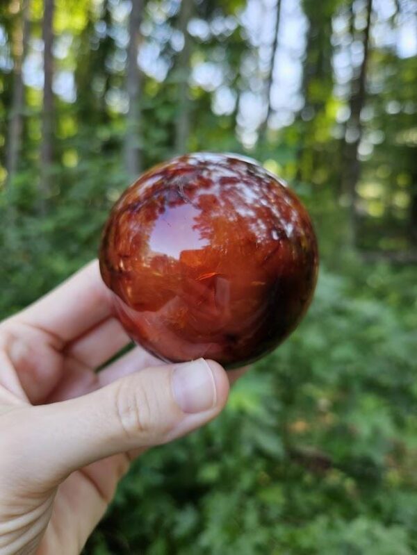 Polished Carnelian Sphere: Sacral Chakra Crystal, Madagascar - Image 8