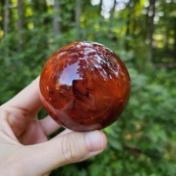 Polished Carnelian Sphere: Sacral Chakra Crystal, Madagascar - Image 3
